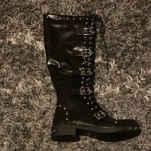 Black Dollskill knee high boots.
